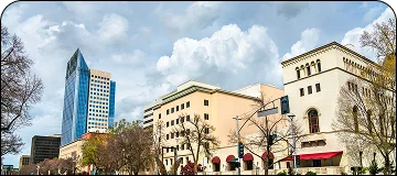 A daytime cityscape of Sacramento with modern and historic buildings, highlighting the capital city`s charm.