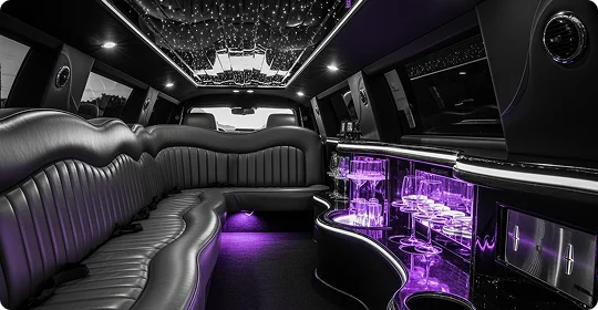 The lavish interior of a limousine, featuring plush leather seats, a bar with glasses, and a ceiling with sparkling star-like lights and purple ambient lighting.